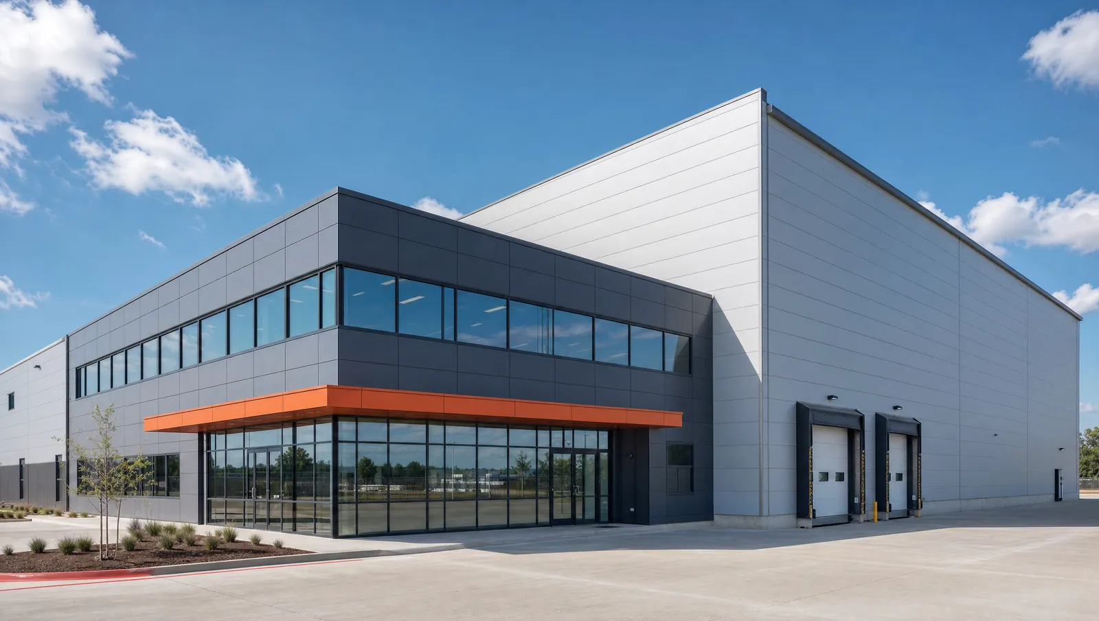 Rendering of a light-manufacturing building with a high-bay hall and two-story office